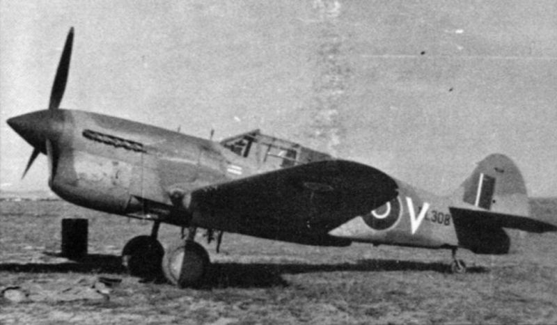 Curtiss
                                  Kittyhawk P-40F
                                  FL308 CV-V ,
                                  RAAF 3 Squadron Leader
                                  Bobby Gibbes, Libya, c.1943.
                                  Photo via Mike Mirkovic