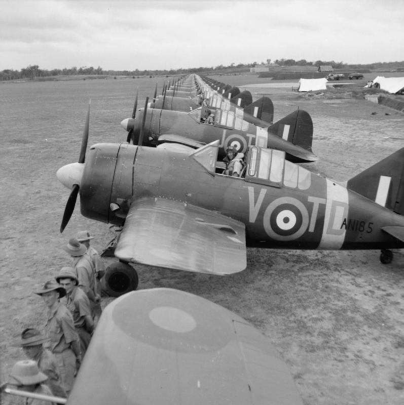 Buffalo Mark Is inc AN185 of No. 453 Squadron RAAF, lined up at Sembawang, Singapore, on the occasion of an inspection by Air Vice Marshal C W H Pulford, Air Officer Commanding Royal Air Force Far East.