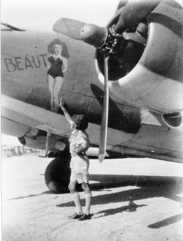Ventura GR.V FP653/D 'You Beaut'
459 Squadron
Gambut
March 1944 
Sdr.Ldr. Jim McHale admiring the the nose art
via Mike Mirkovic.