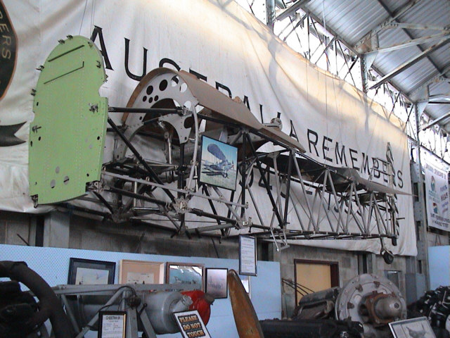 This is an anonymous Hawker Demon at Caboolture.                  Built from a number of airframes by Jack McDonald. It                  appears it has not been given even a nominal identity.                  Any ideas which airframes are involved???