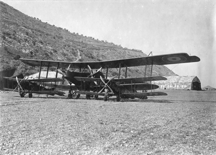 Handley Page 0/400 of 1 Sqn dwarfs the Bristol Fighters parked with it.  via Rod Farquhar.