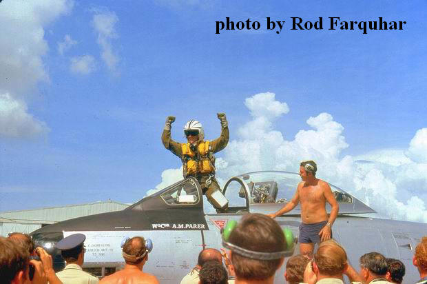A triumphant Wing Commander Mick Parer after his return, the troops were pretty happy also
